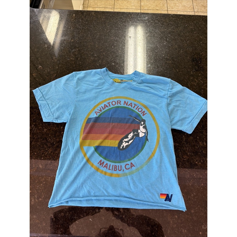 Aviator Nation Boyfriend Tee Signature Surfer Womans XS Light Blue Malibu, CA